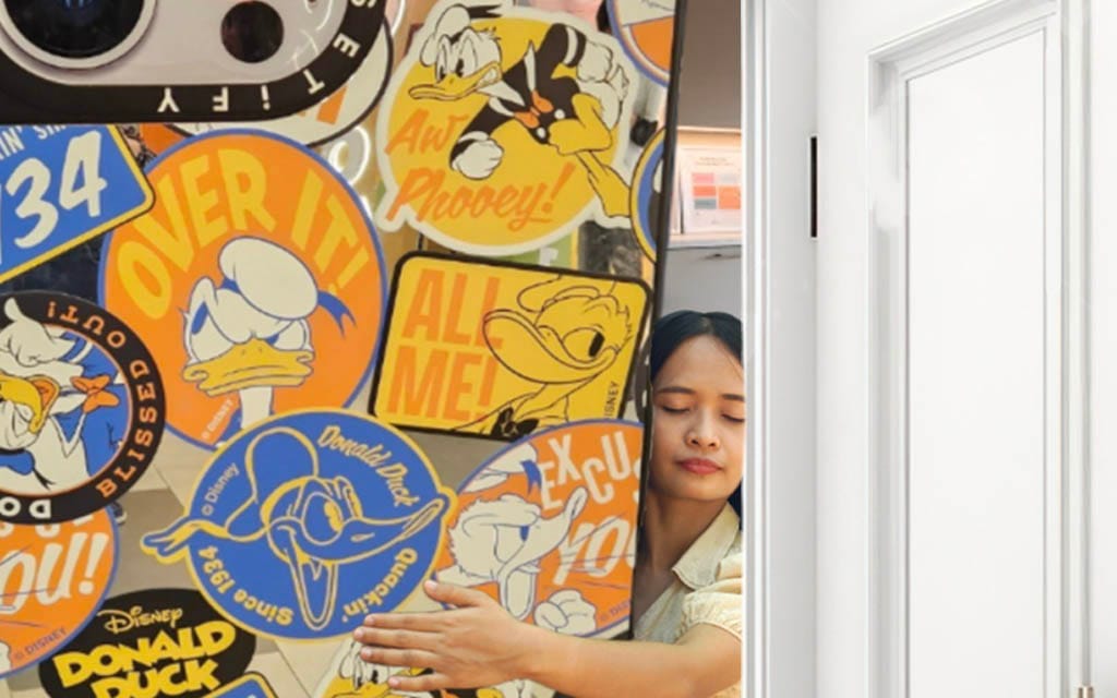 International Student's Over-The-Top Phone Case Barely Fitting Through Doorway