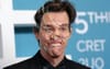 Jim Carrey Dispels Clone Rumours By Attending Show With Tape Around His Head