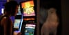 Half-Hearted Pokie Player Using Bottom Of Schooner To Tap Button While Standing