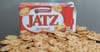 Report: Jatz Only Cracker Strong Enough To Scrape Off Corner Of Brie Cheese