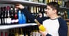 Student Peruses Selection At Bottle-O Likes He’s Not About Rummage Through Bargain Bin