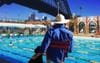 Drought-Stricken Farmer Goes For A Dip In His $10M Local Pool Underneath The Harbour Bridge