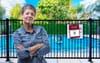 Vigilant Mum Staples QR Check-In on Backyard Pool Gate Before Silly Season Begins