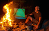 Flakey Dad On Group Holiday Taking Campfire Way Too Seriously
