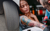 Woman Whose Car Tyres Are As Bald As The Rock Sees No Issue With Dropping $2k On A New Tattoo