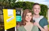 Couple Celebrate Finally Having Some Housing Security By Posing With The ‘Just Leased’ Sign