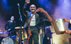 Paul Kelly The Latest Musician To Be Hit By Random Object After Fan Throws Bucket Of Gravy On Stage