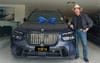 Betoota Editor Clancy Overell Poses With His New BMW X5 Paid For By Pushing The Woke Pro-Voice Agenda