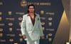 Tino Fa’asuamaleaui Embraces Gold Coast Culture With Scarface-Inspired Linen Suit At 2023 Dally Ms