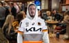 Bloke Rocking NRL Jersey Over Hoodie Acting a Little Bulletproof