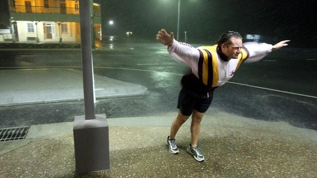 Hobby weather watcher Will Stuckey measures wild wind and rain during Cyclone Anthony as it passes through Bowen. Picture: Lyndon Mechielsen Source: The Australian