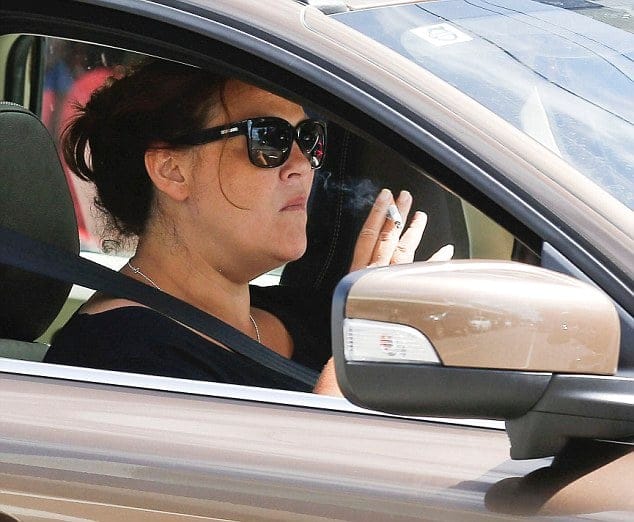 The famous photo of B-list Australian television personality, Chrissie Swan, punching a dart in traffic while pregnant with her third child.