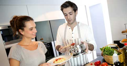 Tom and Emily preparing a "hearty" vegan meal at home. PHOTO: Daily Liberal/AAP
