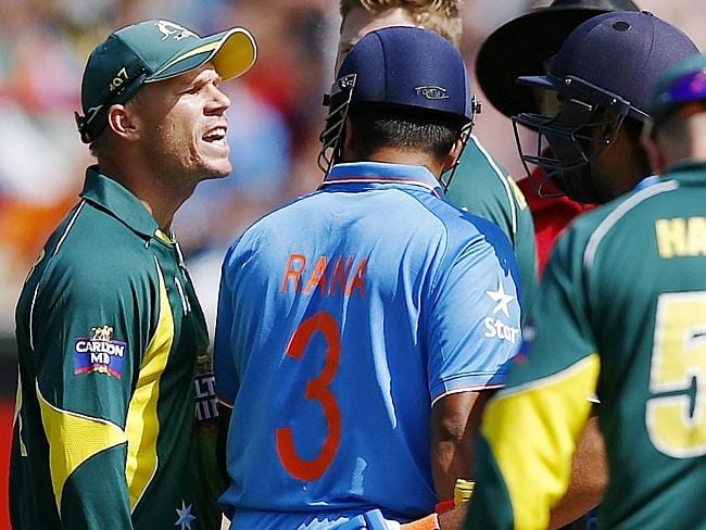 David Warner delivering his "verbal rinsing" to Indian batsman, Rohit Sharma
