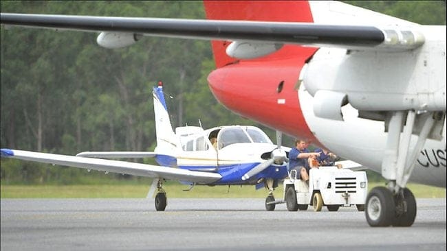 After allegedly performing a "touch and go" on Uluru, a 27-year-old Queensland man has been arrested. PHOTO: NT News 