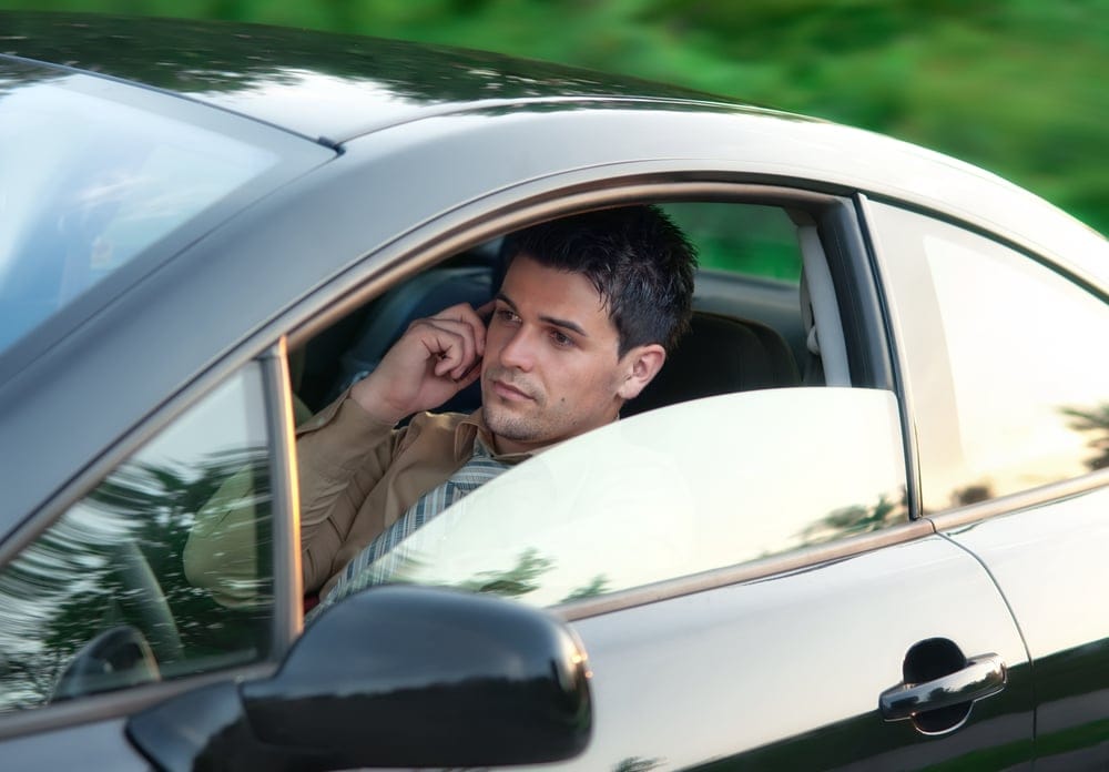 Mr McKinley says once downside of his job is he has to carry multiple mobile phones. PHOTO: Australian Federal Police