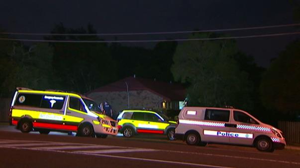 Police investigating the scene outside of Mr Flynn's Taree residence