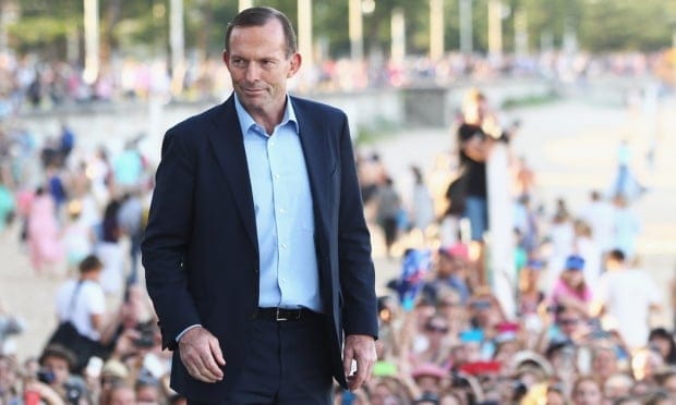 Abbott, looking extremely rich again, in Manly