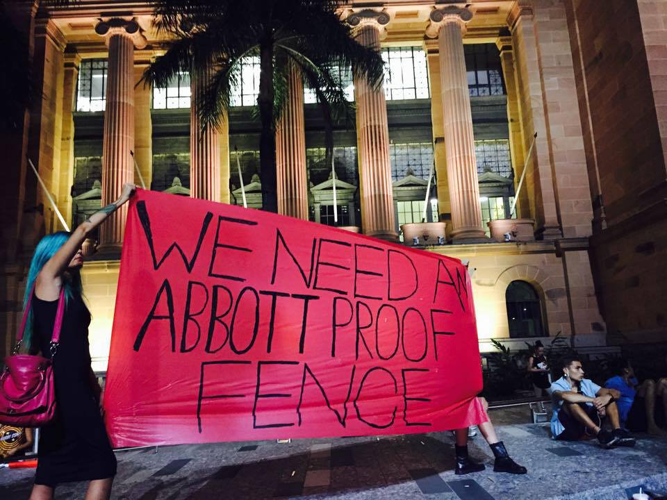Activists take to the streets of Brisbane protesting the imminent closure of Indigenous communities last night. Credit: Gracie Eather