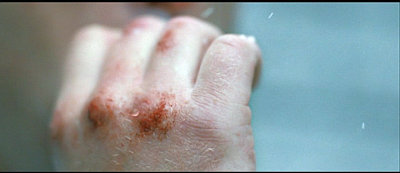 Mr Flynn's hands, photographed as he left the Taree police station