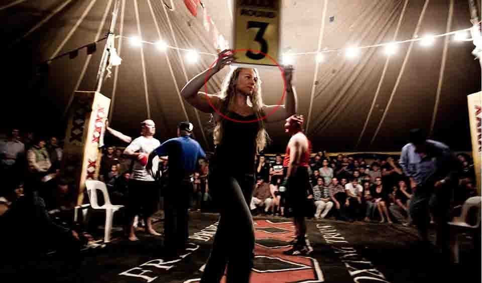 Kerri-Anne Wesser, wife of local policeman Rhys Wesser, earns a few extra dollars as the "ring-girl"