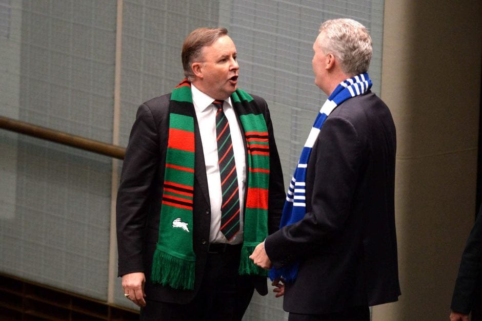 Albanese represents his hometown in Parliament by wearing the red and green colours of South Sydney Rugby League Football