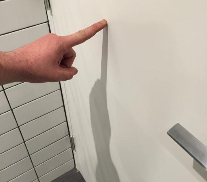 Mr Hatton just manages to get his finger to touch the door and keep it shut.